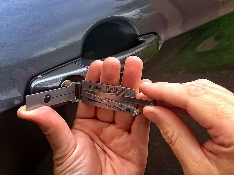 Lock tool at a car door handle before opening a locked vehicle in Milwaukee