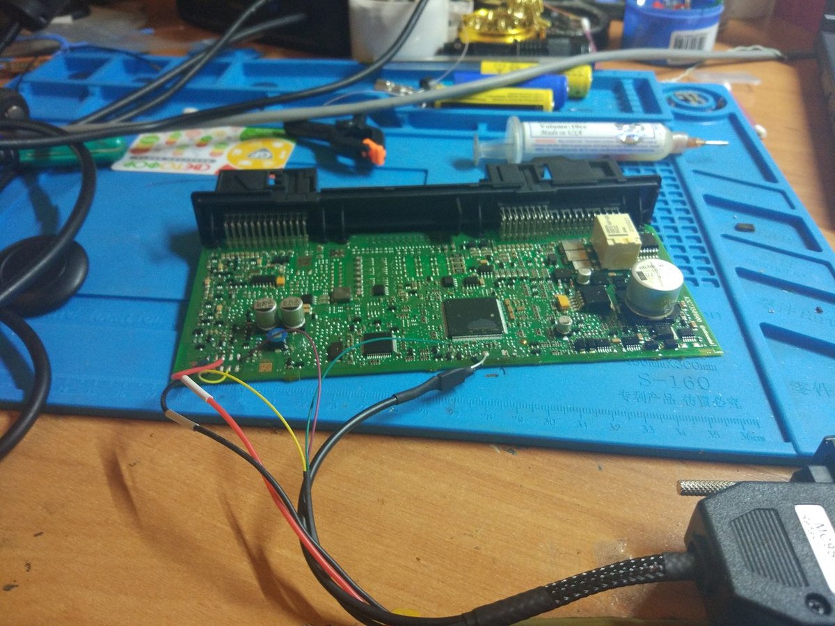 Vehicle module wired up on the work mat for a direct read